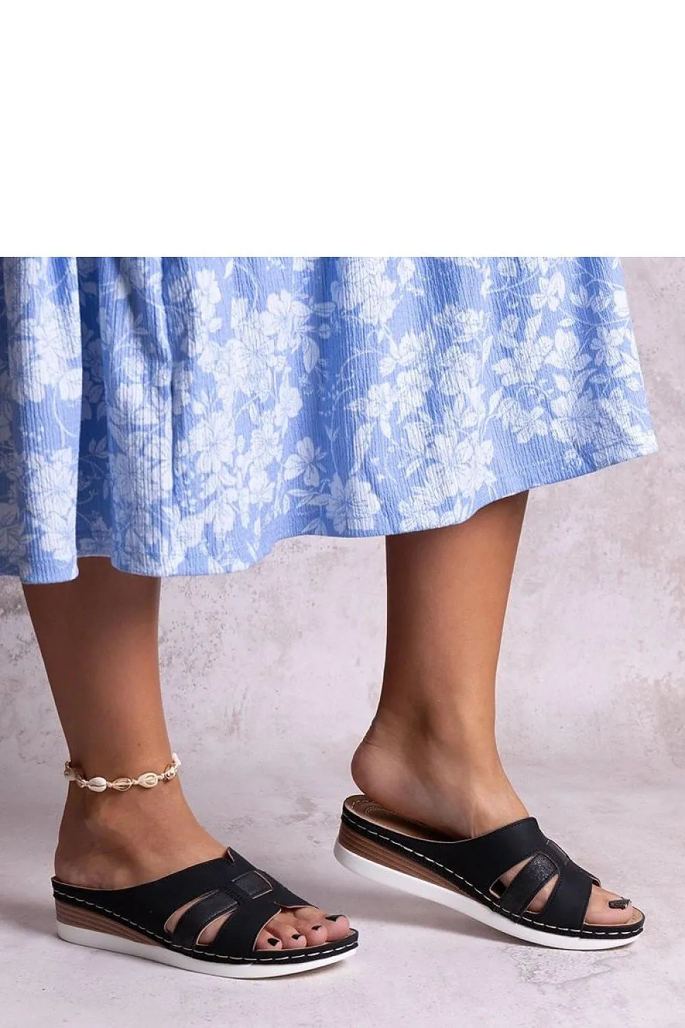 Beige lightweight slides with a low wedge heel