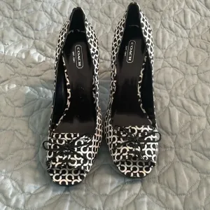 Coach shoes, size 8. Never worn